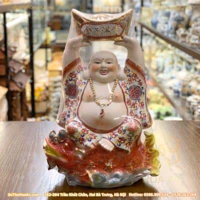Tượng Di Lặc Sứ Áo Gấm Dâng Vàng Ngồi Cá Hoá Rồng